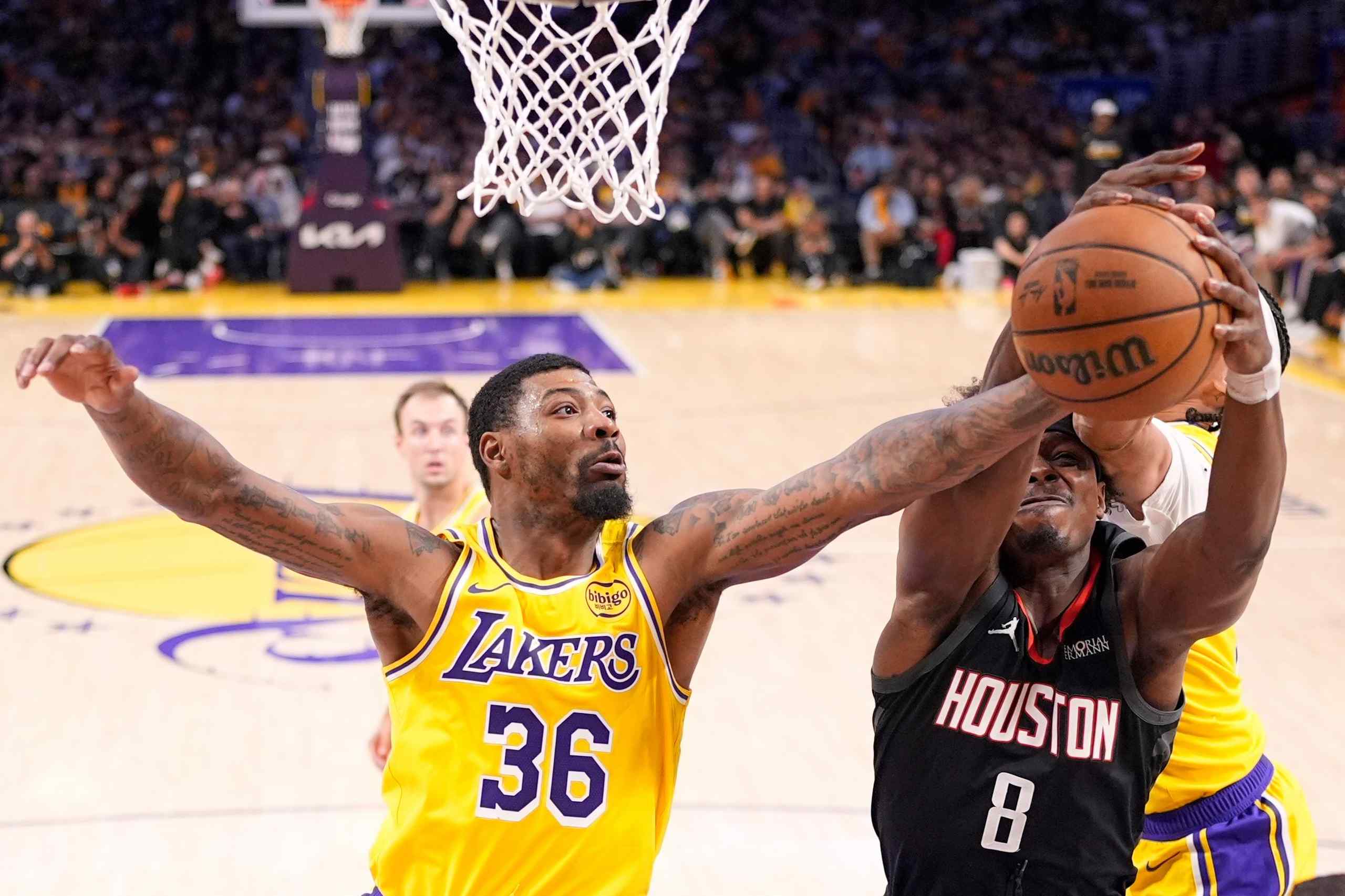 The Lakers' Marcus Smart defends.